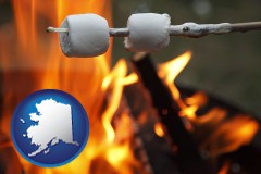 alaska map icon and roasting marshmallows on a camp fire