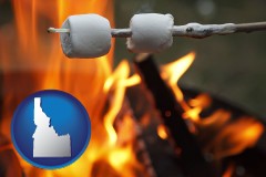 idaho map icon and roasting marshmallows on a camp fire