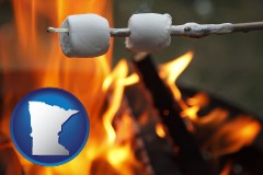 minnesota map icon and roasting marshmallows on a camp fire