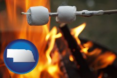 nebraska map icon and roasting marshmallows on a camp fire