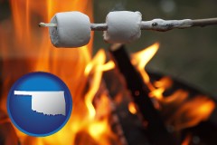 oklahoma map icon and roasting marshmallows on a camp fire