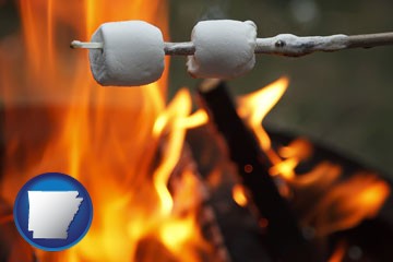 roasting marshmallows on a camp fire - with Arkansas icon