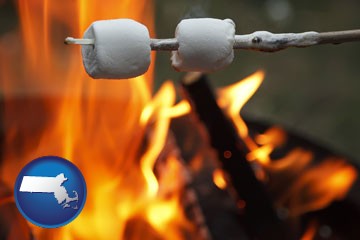 roasting marshmallows on a camp fire - with Massachusetts icon