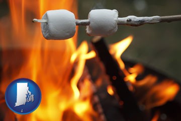 roasting marshmallows on a camp fire - with Rhode Island icon